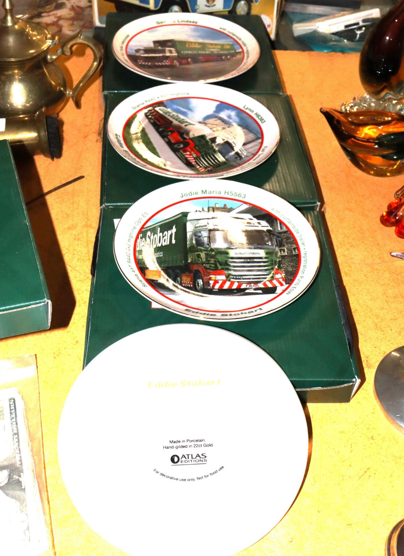 FOUR EDDIE STOBART BY ATLAS, CABINET PLATES IN ORIGINAL BOXES