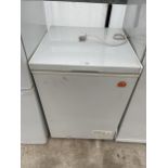 A SMALL WHITE IGLOO CHEST FREEZER