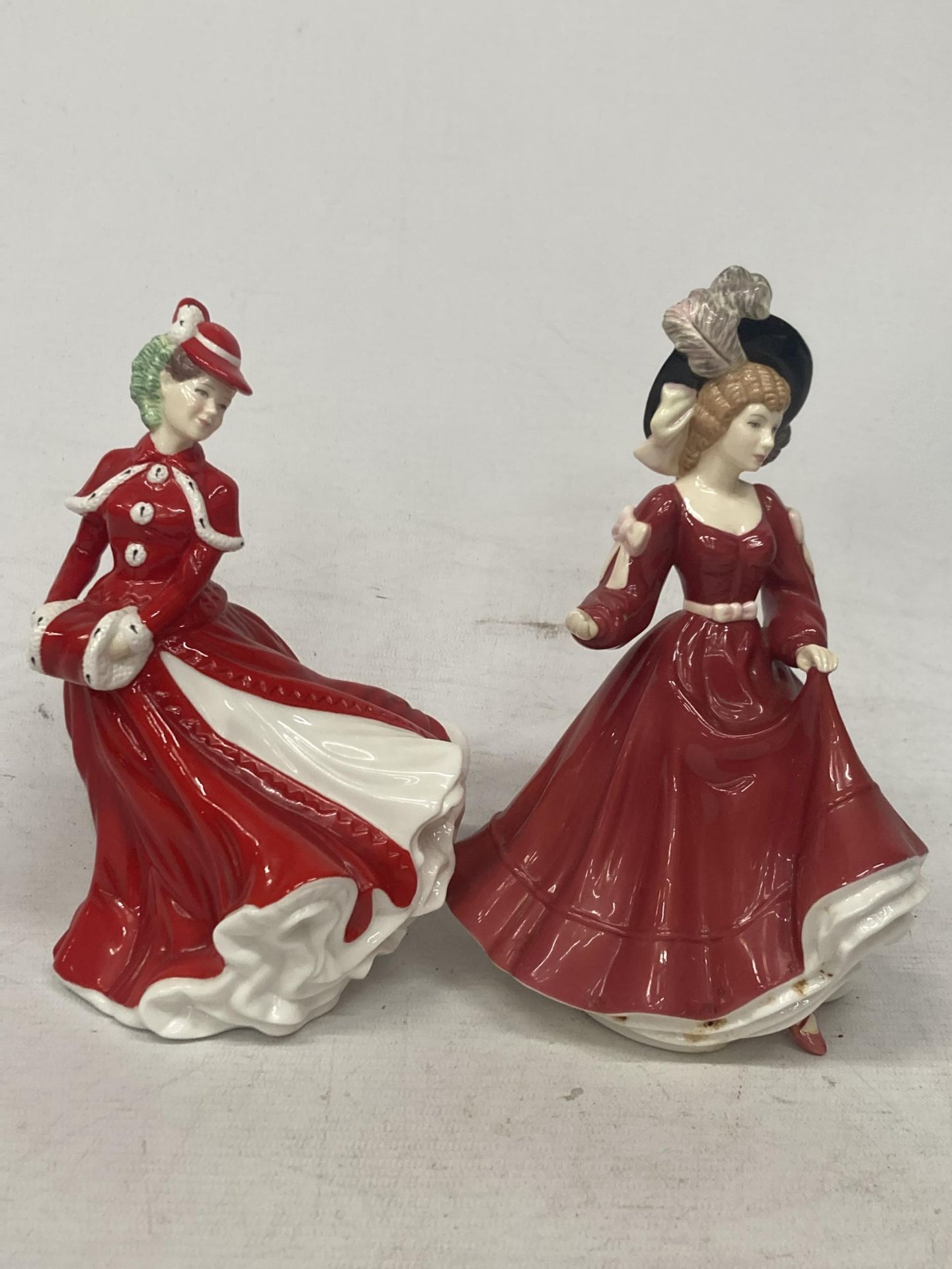 TWO ROYAL DOULTON FIGURINES FROM THE PRETTY LADIES COLLECTION - "CHRISTMAS CELEBRATION" AND "