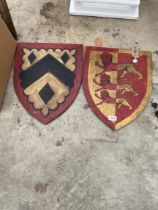 TWO WOODEN HAND PAINTED SHIELD SIGNS