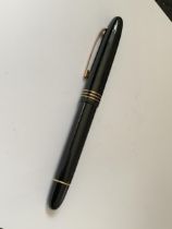 AN OMAS FOUNTAIN PEN MARKED THE MUSEUM OF MODERN ART NEW YORK WITH AN 18 CARAT GOLD NIB