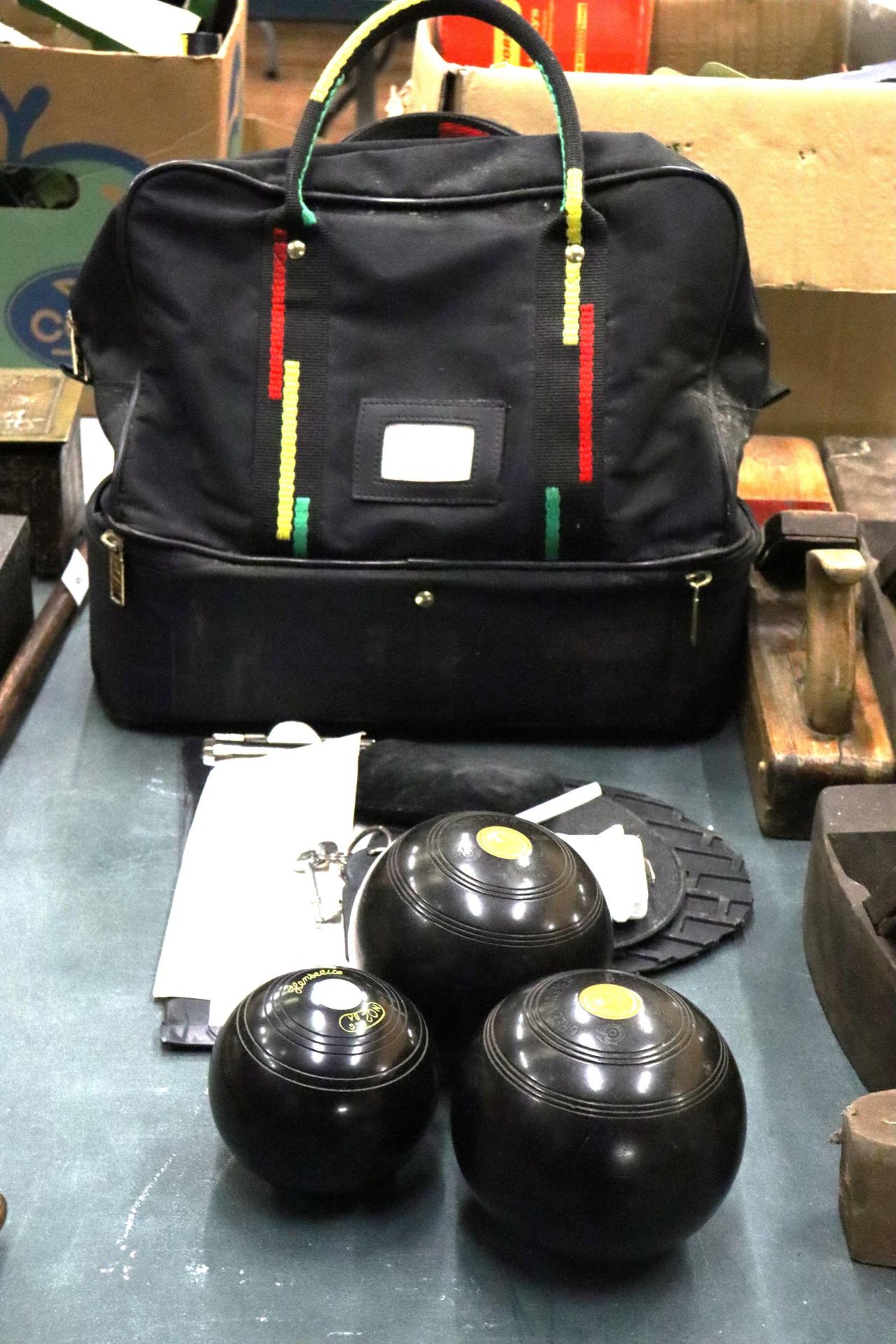 A PAIR OF GREENMASTER BOWLS, A JACK, ACCESSORIES AND A BOWLING BAG