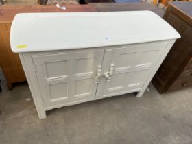 A PAINTED PRIORY STYLE DRESSER BASE