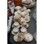 AN ART DECO CHILD'S TEASET WITH CHILDREN'S CHARACTERS TO INCLUDE A TEAPOT, SUGAR BOWL, CREAM JUG,