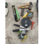 A COLLECTION OF HAND TOOLS TO INCLUDE PRUNERS, AN AXE AND A TAPE MEASURE ETC