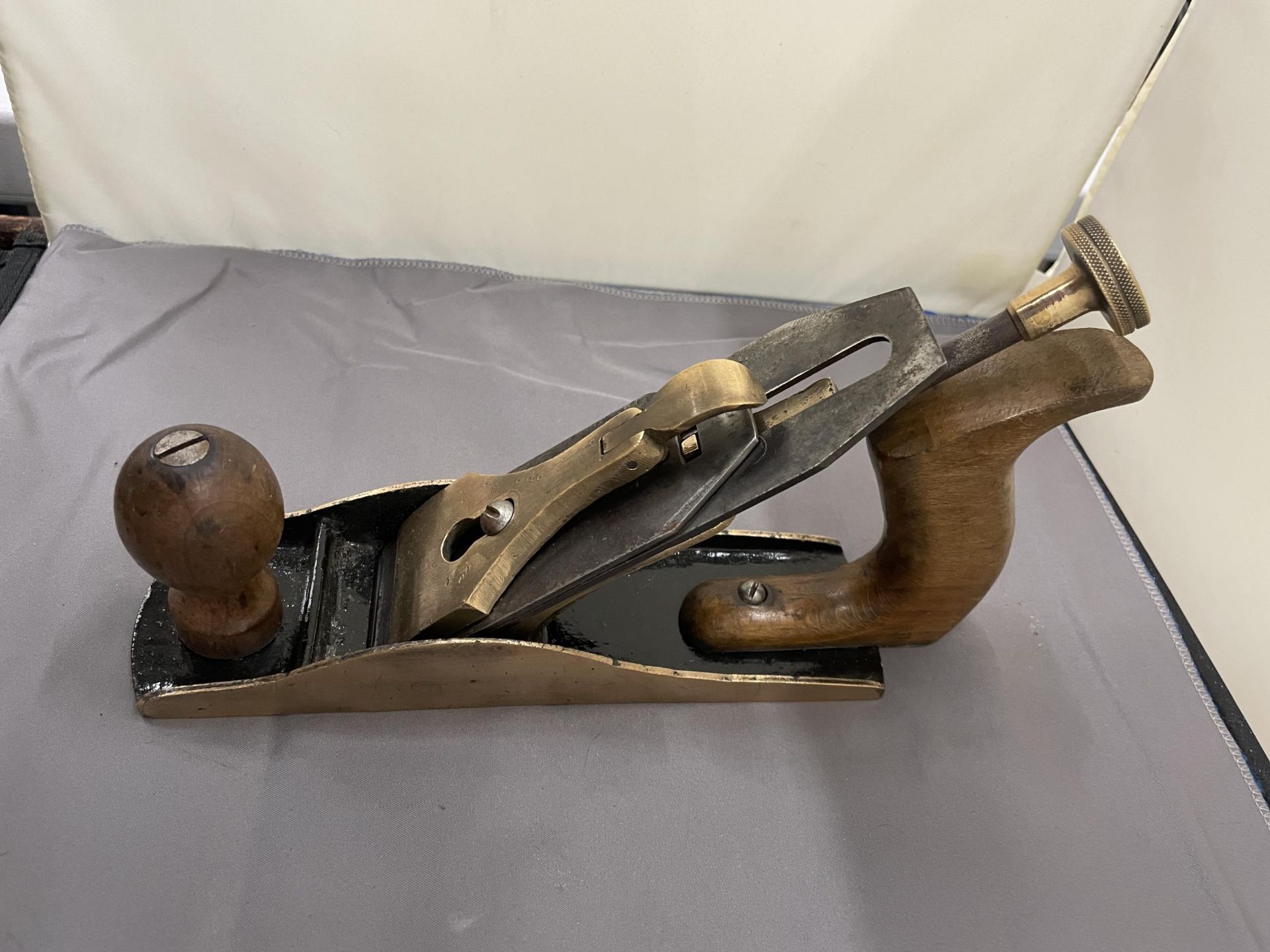 A VINTAGE BRASS BODIED PLANE