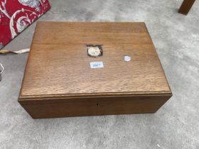 AN EDWARDIAN OAK CUTLERY CANTEEN BY MALLORY OF BATH