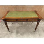 A REGENCY STYLE MAHOGANY TABLE ENCLOSING THREE DRAWERS AND THREE SHAM DRAWERS WITH INSET LEATHER TOP