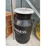 A VINTAGE HAND PAINTED GUINESS ADVERTISING MILK CHURN WITH LID (H:65CM)