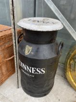 A VINTAGE HAND PAINTED GUINESS ADVERTISING MILK CHURN WITH LID (H:65CM)