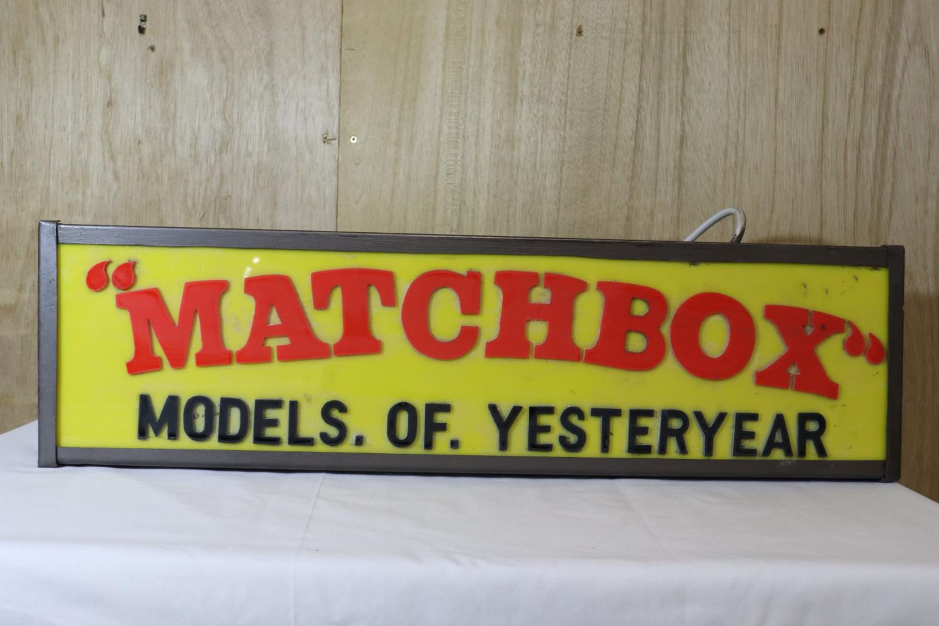 AN ILLUMINATED MATCHBOX MODELS OF YESTERDAY SIGN - 72 X 20 CM