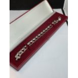 A HEAVY SILVER LINK BRACELET IN A PRESENTATION BOX