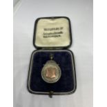 A BIRMINGHAM HALLMARKED SILVER FOOTBALL MEDAL IN ITS ORIGINAL DERBYSHIRE FOOTBALL ASSOCIATION