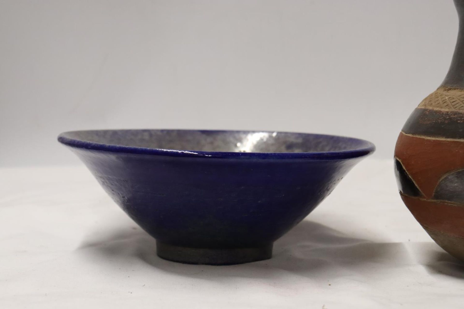 A BLUE AND PEARLESCENT STUDIO POTTERY STYLE BOWL TOGETHER WITH A STONEWARE JUG - Image 2 of 4