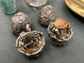 TWO PEWTER TUDOR MINT EGGS WITH ZODIAC SIGNS CANCER AND SCORPIO TO THE INSIDE