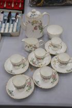 A MINTON 'DAINTY SPRAYS' COFFEE SET TO INCLUDE A COFFEE POT, CREAM JUG, SUGAR BOWL, CUPS AND SAUCERS