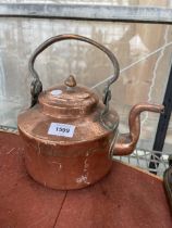 A VINTAGE COPPER KETTLE