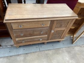 A VICTORIAN PINE AND BEECH KITCHEN DRESSER BASE ENCLOSING THREE DRAWERS AND CUPBOARD ALL WITH