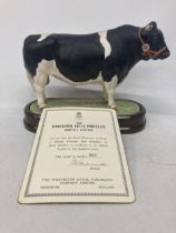 A ROYAL WORCESTER MODEL OF A BRITISH FRESIAN BULL MODELLED BY DORIS LINDNER AND PRODUCED IN A