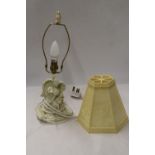 A TABLE LAMP WITH A CLASSICAL FIGURE TO THE BASE AND LAMP SHADE