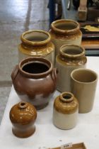 A COLLECTION OF STONEWARE STORAGE JARS - 7 IN TOTAL