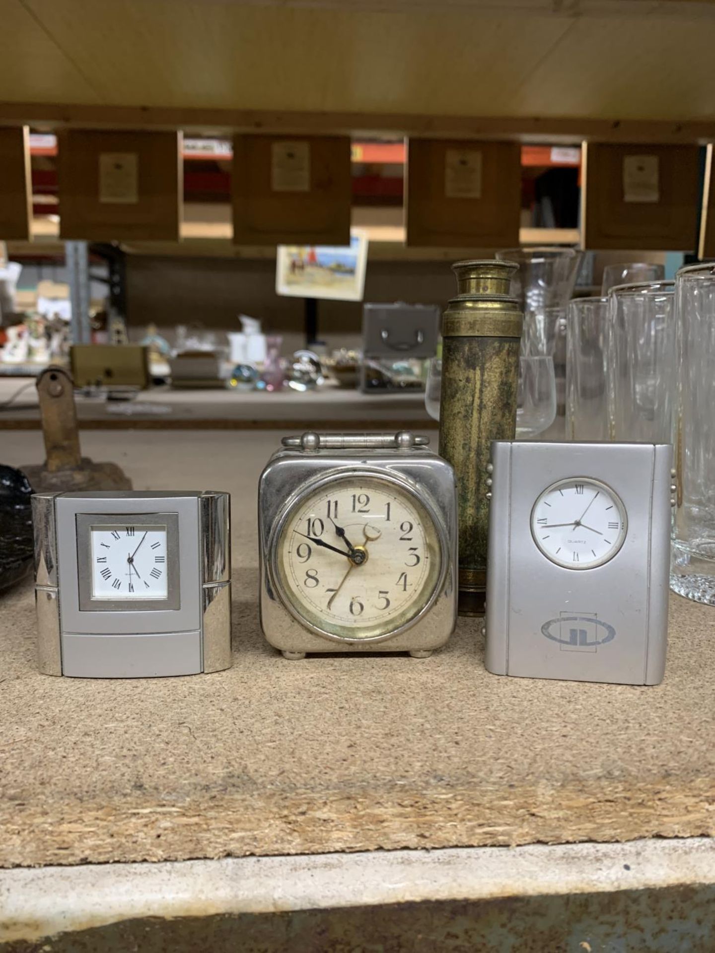 THREE SMALL MANTLE CLOCKS PLUS A BRASS TELESCOPE