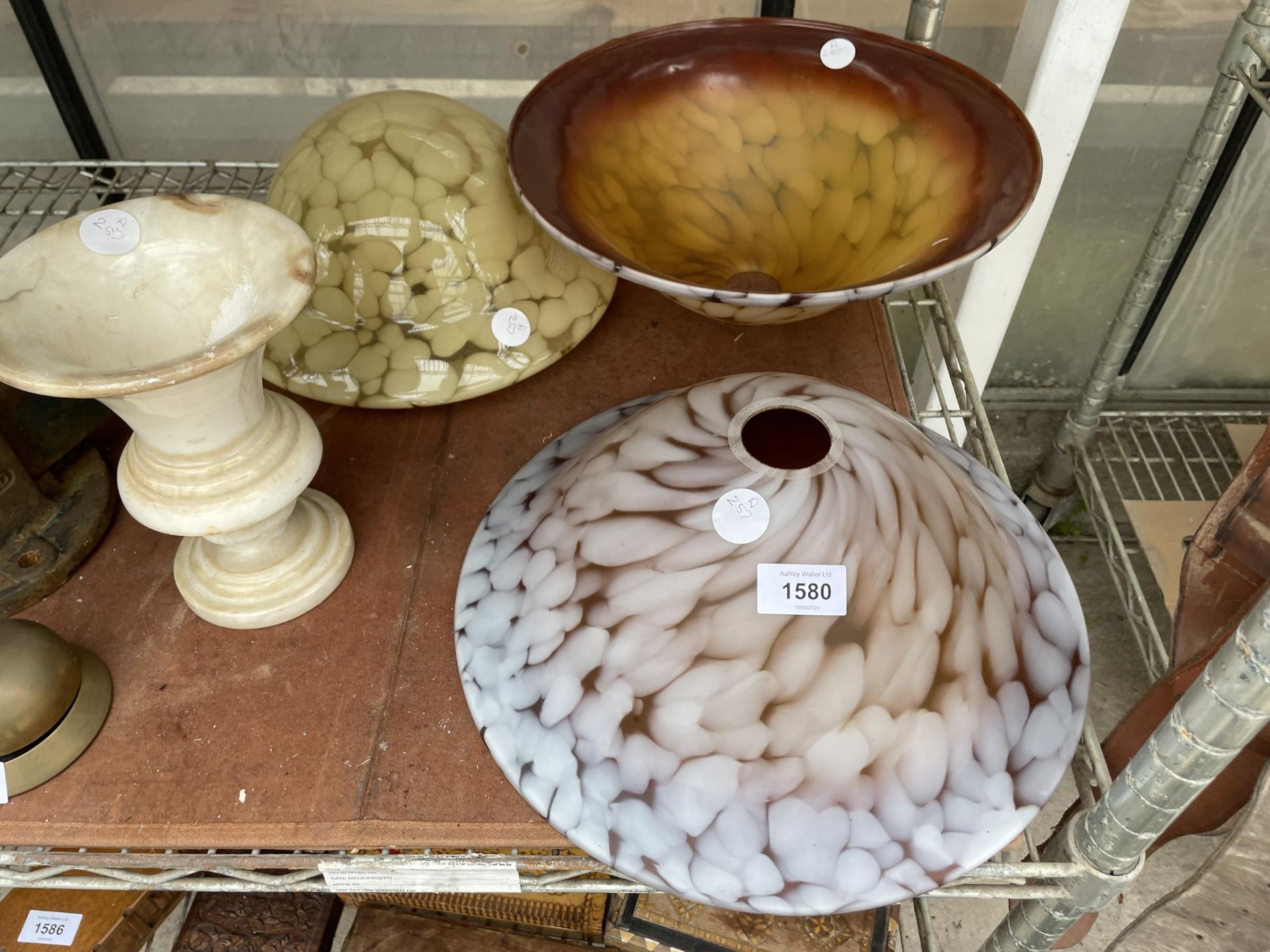 A MARBLE VASE AND THREE RETRO GLASS LIGHT SHADES