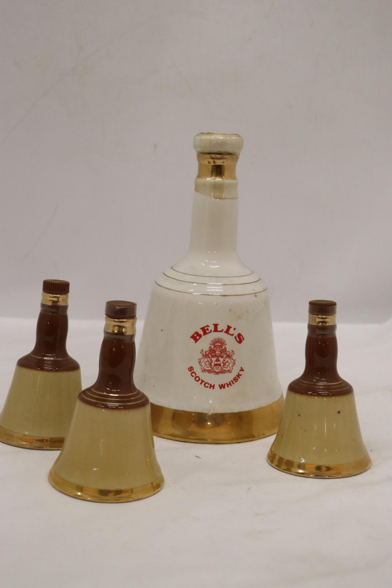 ONE LARGE AND THREE SMALL, BELL'S WHISKY CERAMIC DECANTERS - Image 3 of 4