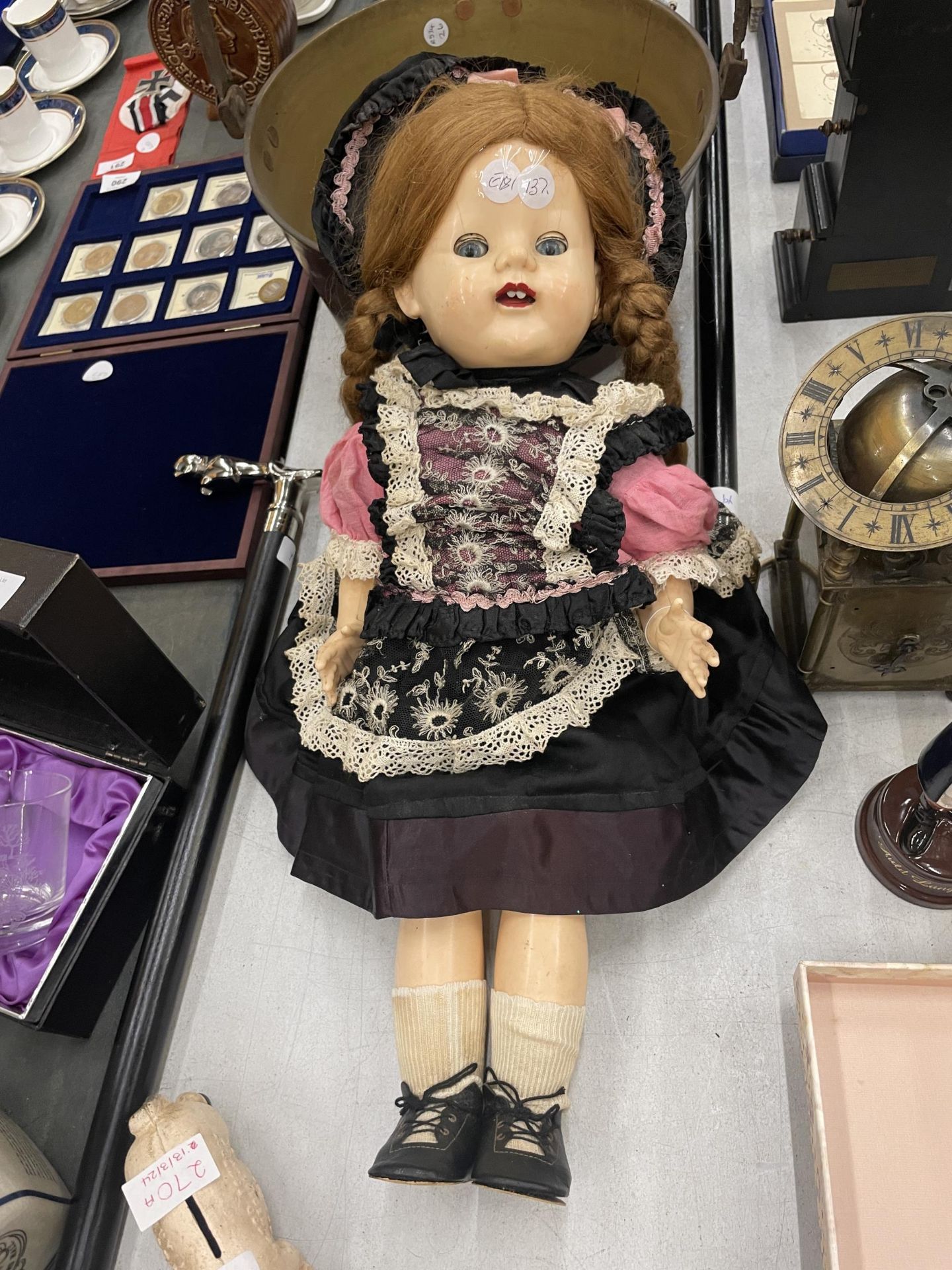 A VINTAGE 1950'S DOLL WITH SLEEPY EYES