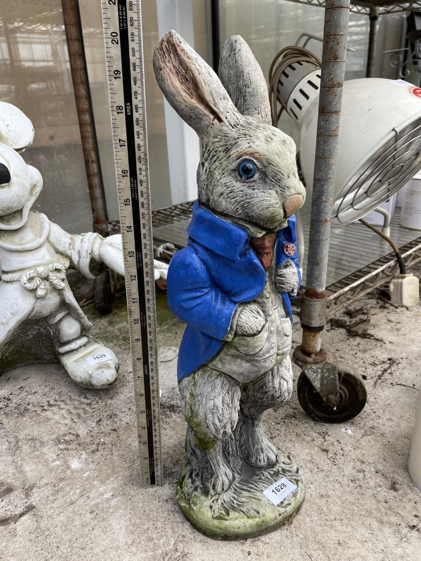 A RECONSTITUTED STONE PETER RABBIT FIGURE