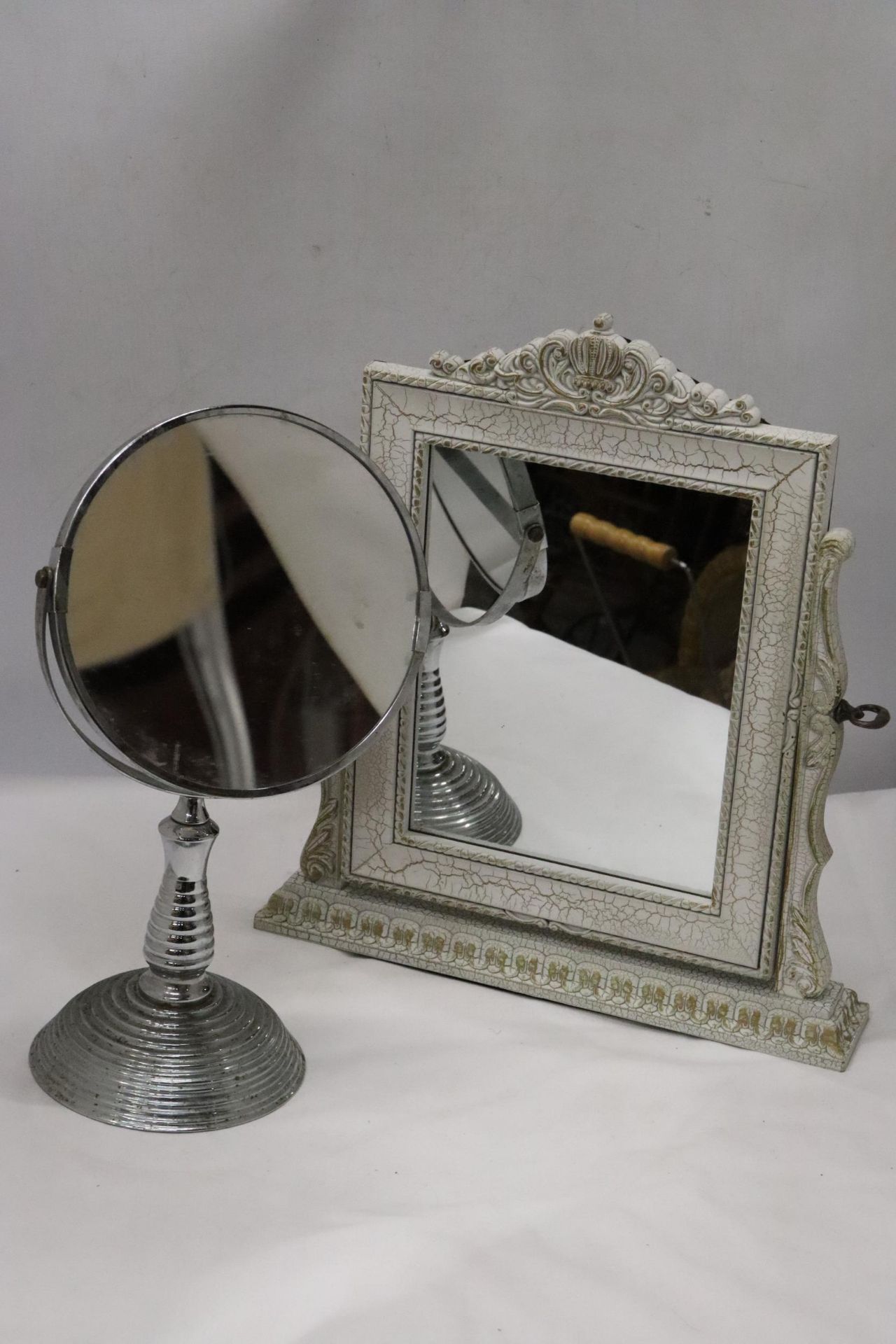 A DRESSING TABLE MIRROR AND A DOUBLE SIDED SHAVING MIRROR