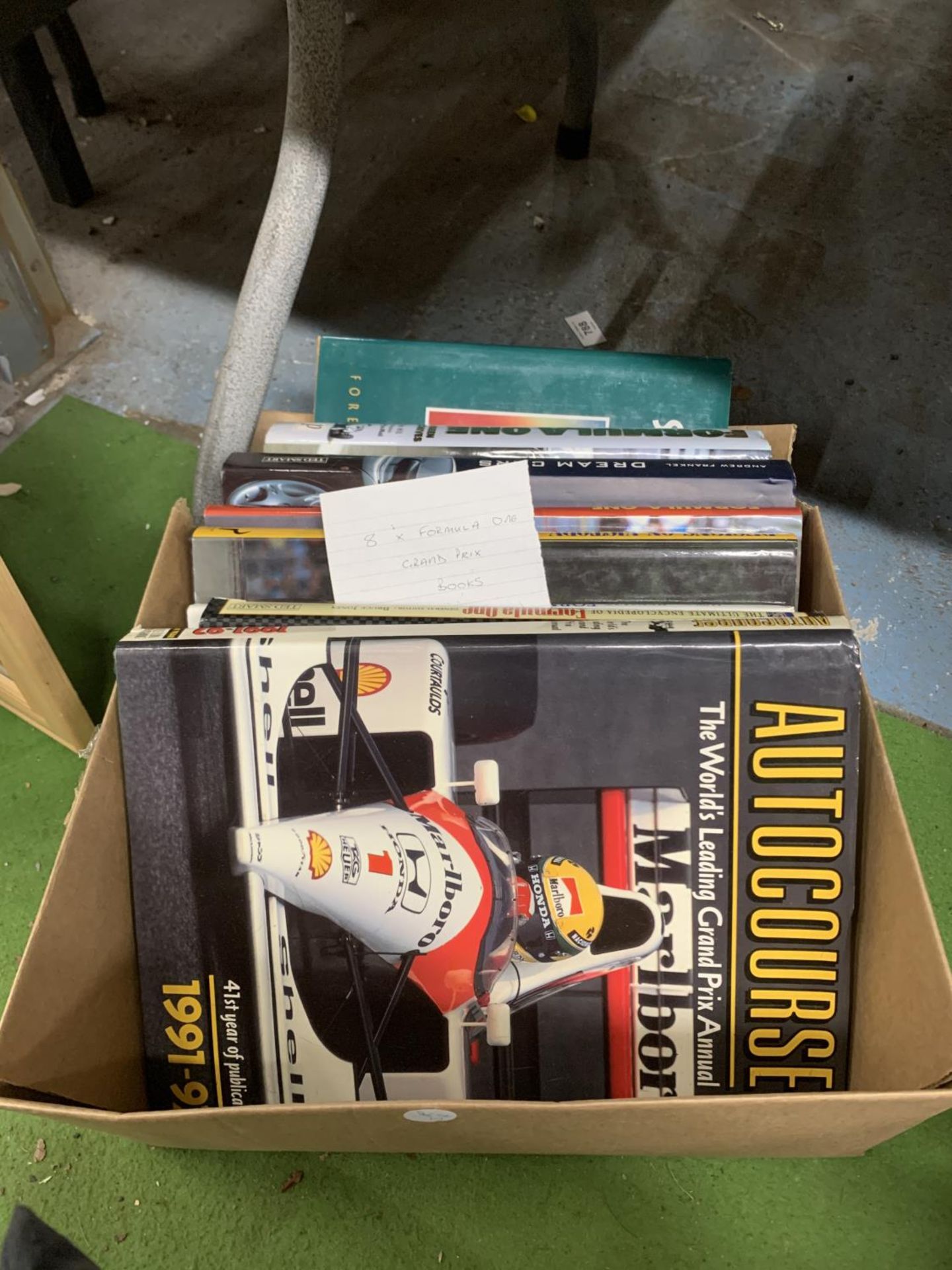 A QUANTITY OF FORMULA ONE CAR BOOKS