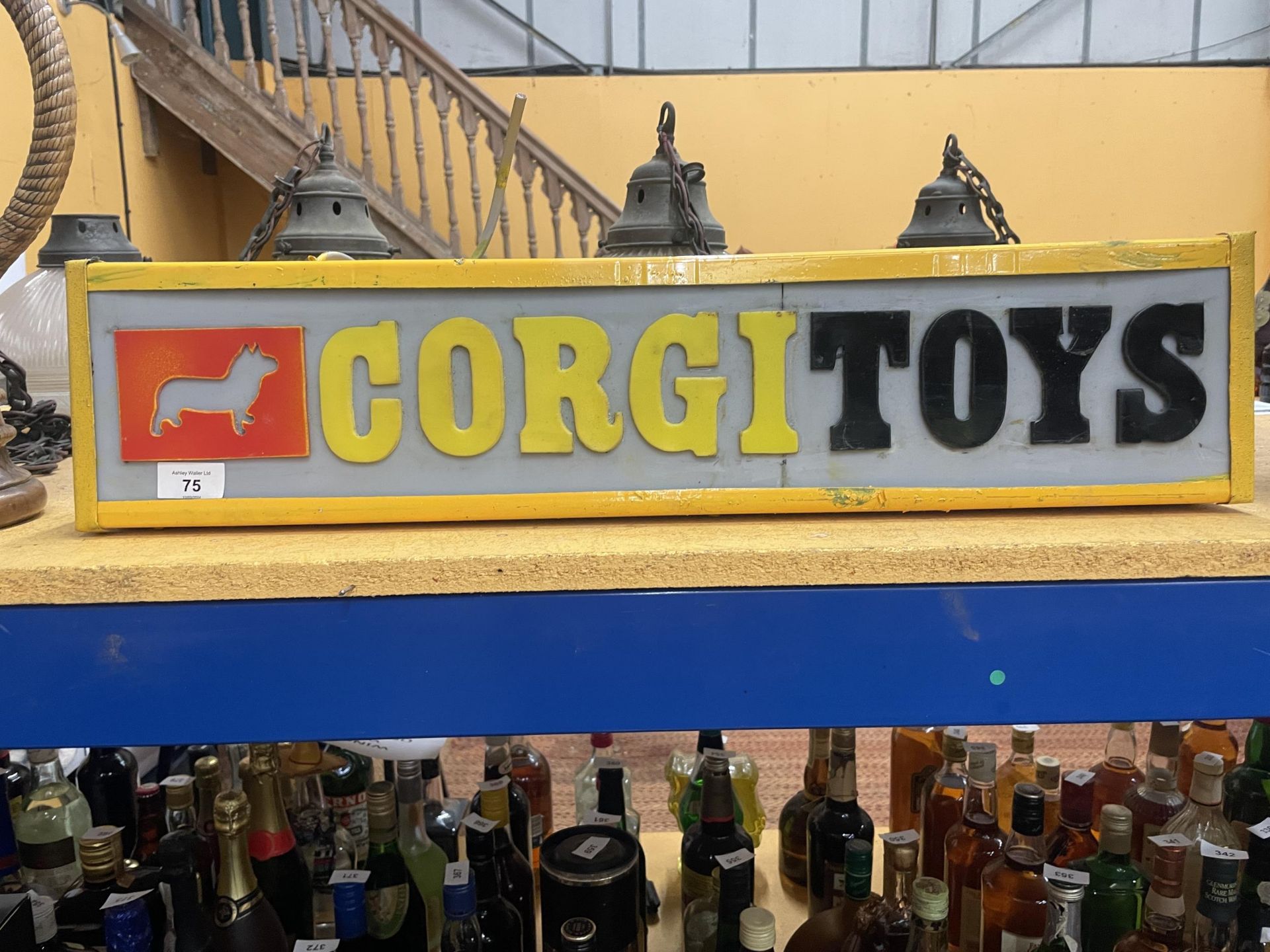 AN ILLUMINATED CORGI TOYS SIGN