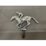 A CHROME VINTAGE HORSE AND JOCKEY CAR MASCOT