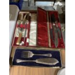 THREE VINTAGE BOXED FLATWARE SETS TO INCLUDE TWO CARVING AND ONE FISH SERVING