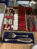 THREE VINTAGE BOXED FLATWARE SETS TO INCLUDE TWO CARVING AND ONE FISH SERVING