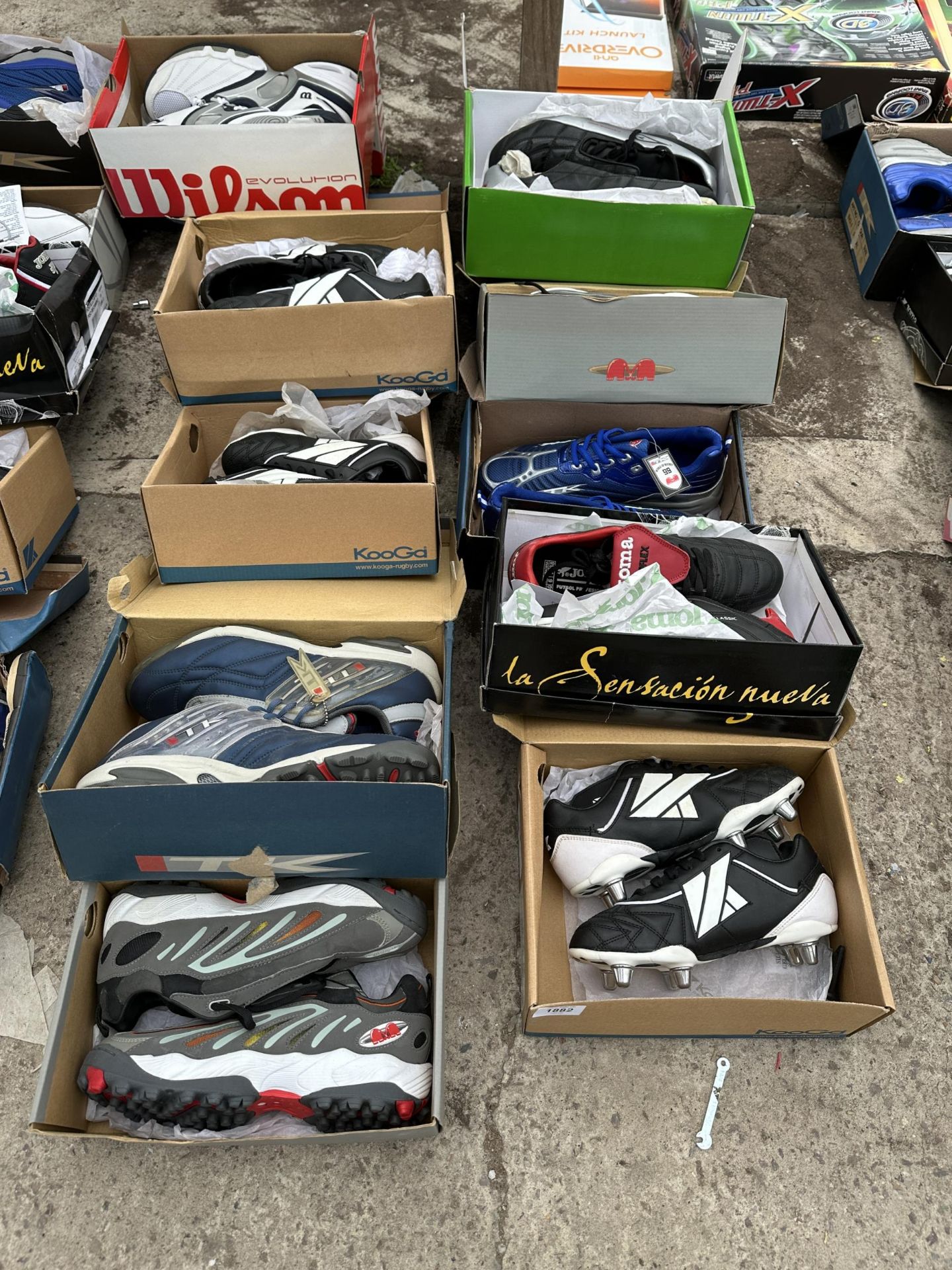 TEN PAIRS OF AS NEW AND BOXED SPORTS BOOTS AND TRAINERS