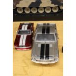 A LARGE MODEL OF A 1968 FORD SHELBY PLUS A MAISTO 1967 FORD MUSTANG