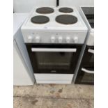 A WHITE AND BLACK SIMFER ELECTRIC OVEN AND HOB