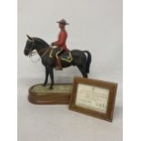A ROYAL WORCESTER MODEL OF A ROYAL CANADIAN MOUNTED POLICEMAN MODELLED BY DORIS LINDNER AND PRODUCED