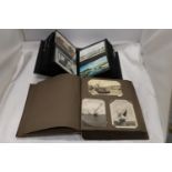 TWO POSTCARD ALBUMS WITH SHIPPING INTERST POSTCARDS