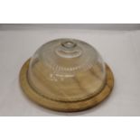 A VINTAGE WOODEN CAKE/CHEESE BOARD WITH GLASS DOME