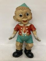 A VINTAGE ITALIAN PINNOCHIO PLASTIC FIGURE - APPROX 52 CM