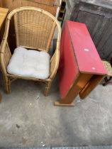 A FORMICA TOP KITCHEN TABLE, AND A WICKER AND BAMBOO CONSERVATORY CHAIR