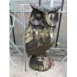 A LARGE CARVED WOOD FIGURE OF AN OWL (H:106CM)