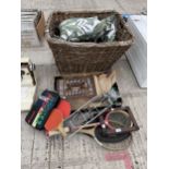 AN ASSORTMENT OF ITEMS TO INCLUDE A LARGE WICKER LOG BASKET, TENNIS RACKETS AND A VINTAGE AUTOBRIDGE