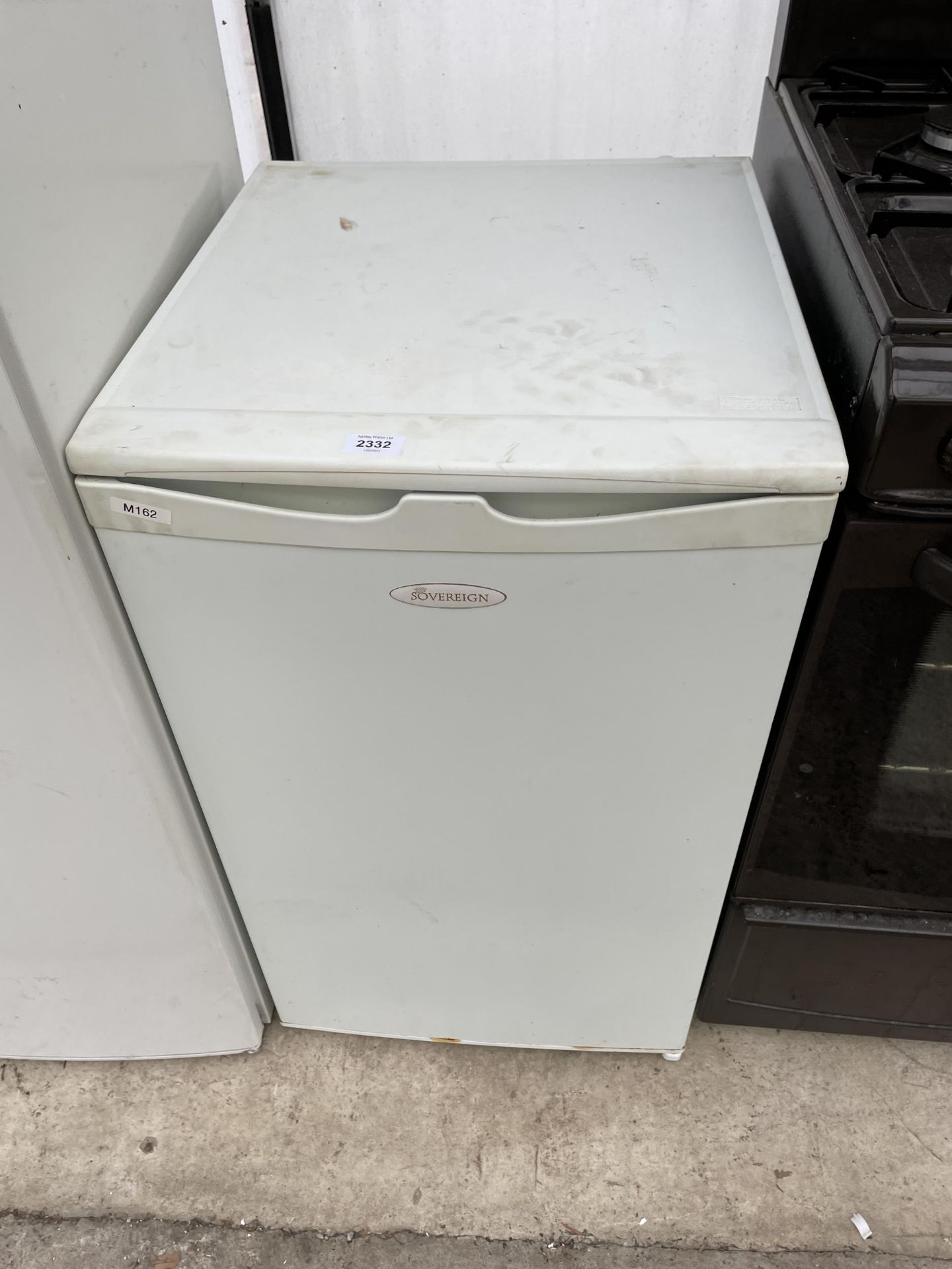 A WHITE SOVEREIGN UNDERCOUNTER FREEZER