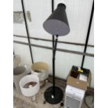 A TALL ADJUSTABLE STANDARD LAMP
