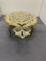 A VICTORIAN BRASS TRIVET