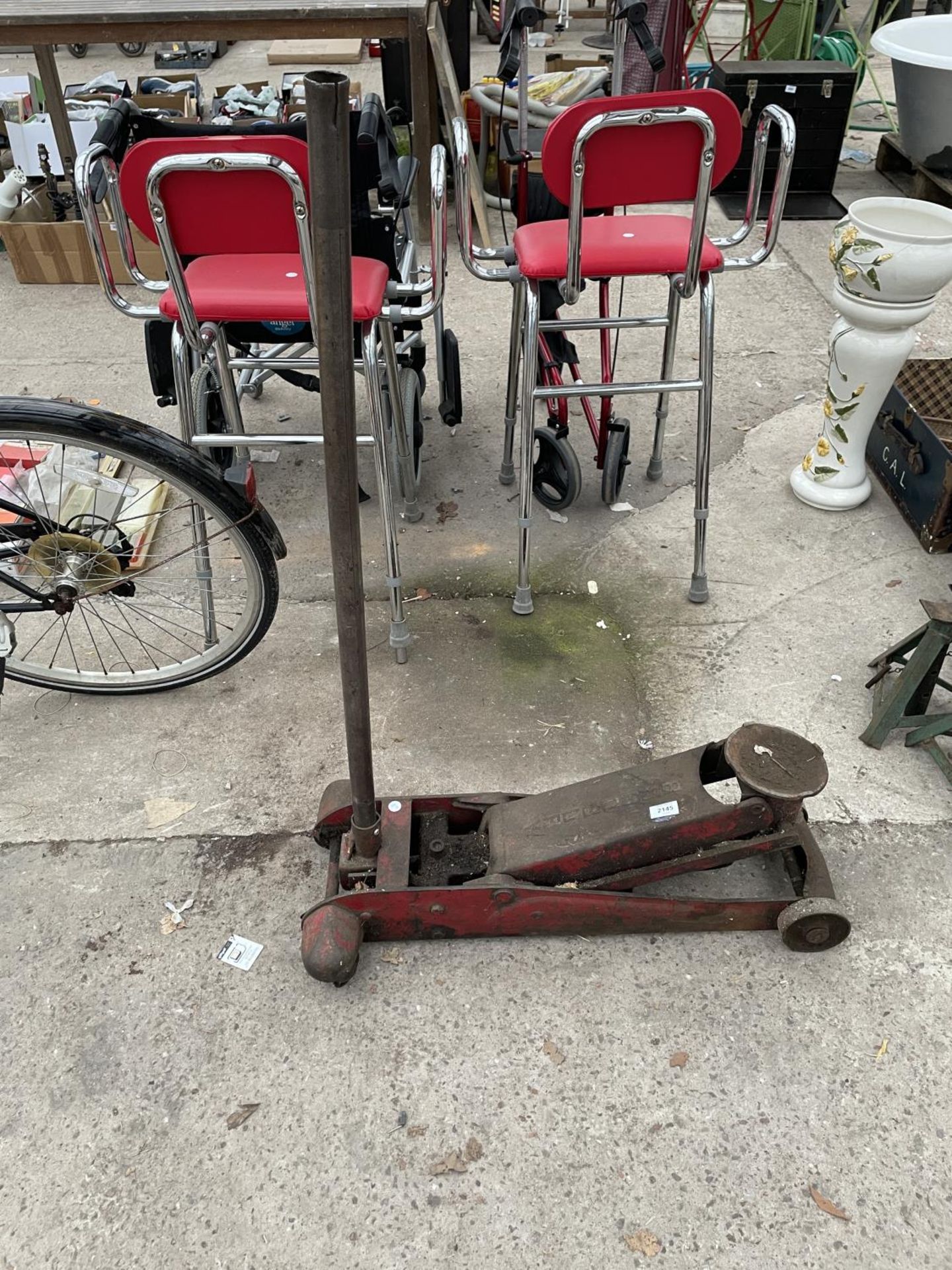 A LARGE HEAVY DUTY TROLLEY JACK